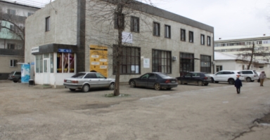 0,0450 га жер телімімен дүкені бар ғимарат